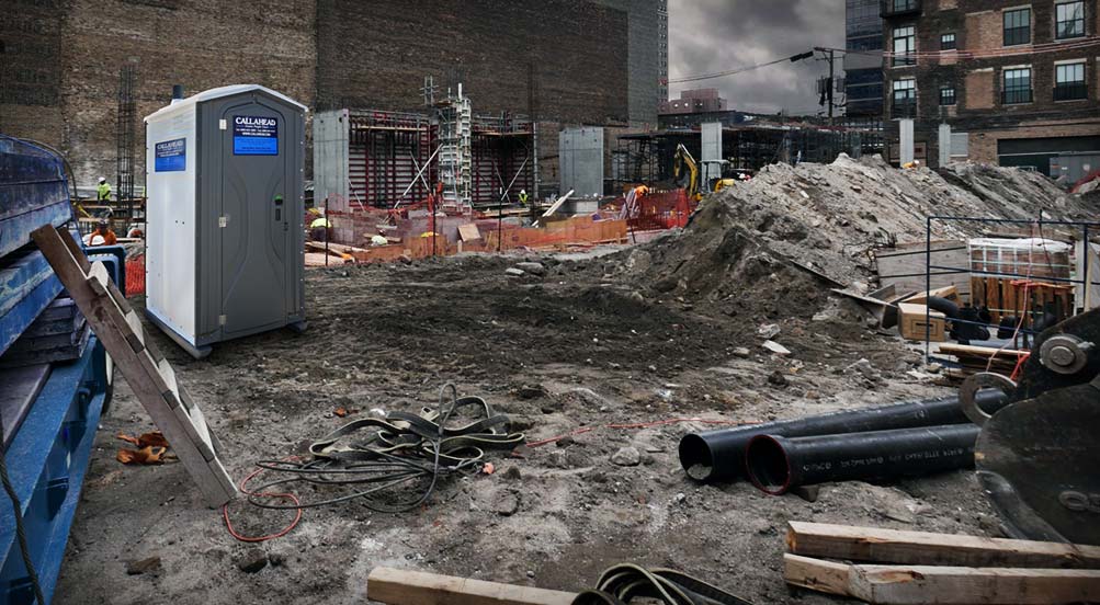 The Construction Wash and Flush Portable Toilet Near Building Site