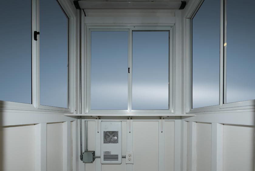 ROOMY INTERIOR WITH 3 LARGE SLIDING WINDOWS, PLUS WINDOW ON DOOR