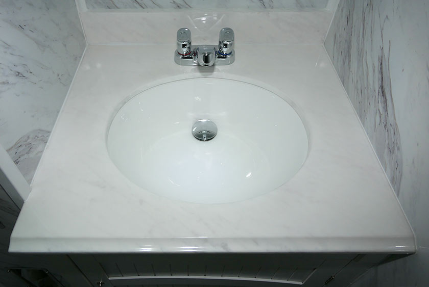 SINK AREA IS CARRERA MARBLE FOR DURABLITY