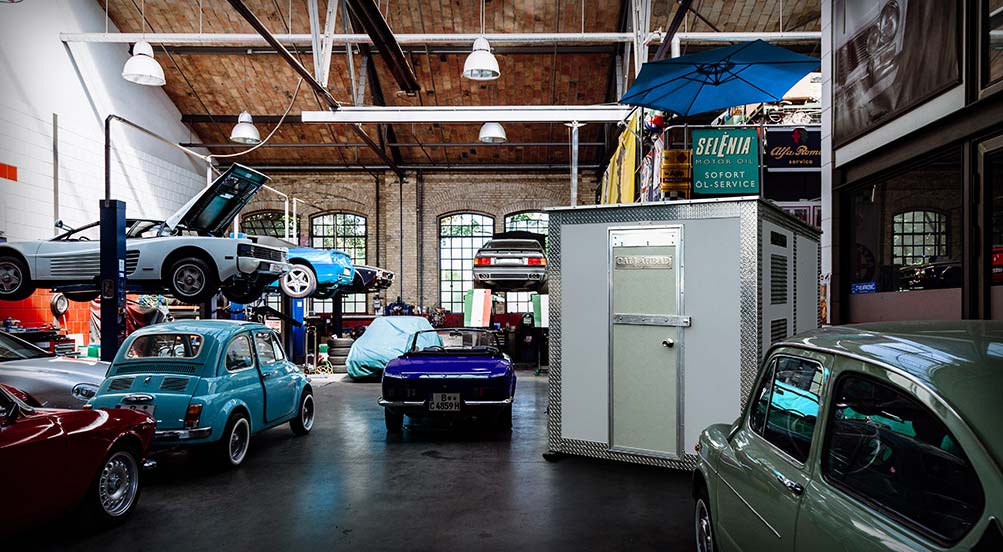 THE A48 STORAGE SHED SHOWN INSIDE A MECHANIC'S SHOP