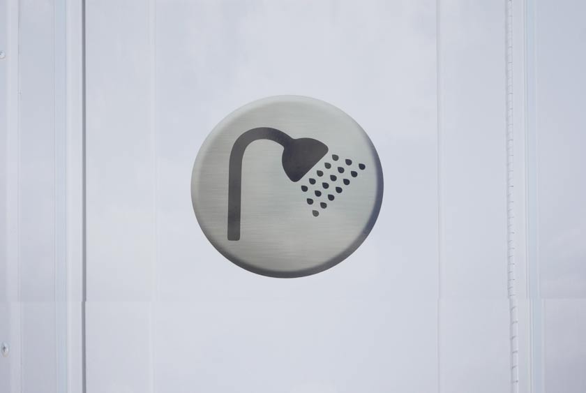 SIGNAGE INDICATES SHOWER USE ONLY