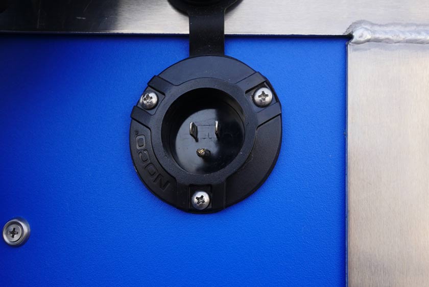 WEATHER RESISTANT 100 VOLT AC PORT ON THE SIDE OF THE UNIT