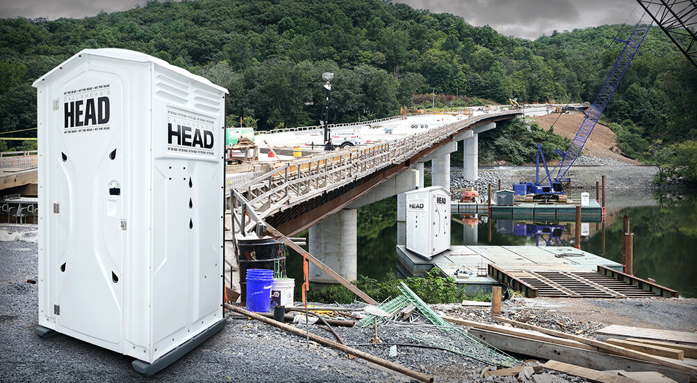 The Head Portable Toilet Near Bridge Construction