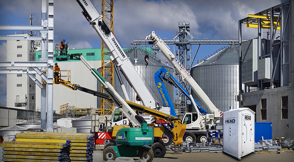 The Head Portable Toilet Near Industrial Construction