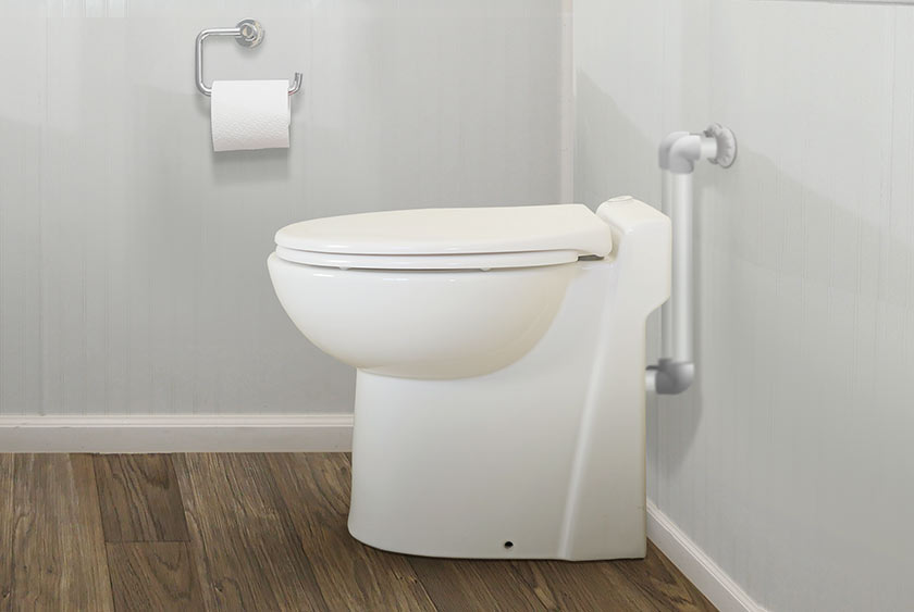 THE <b>MAC TOILET SYSTEM</b> INSIDE SHIPPING CONTAINER OFFICE