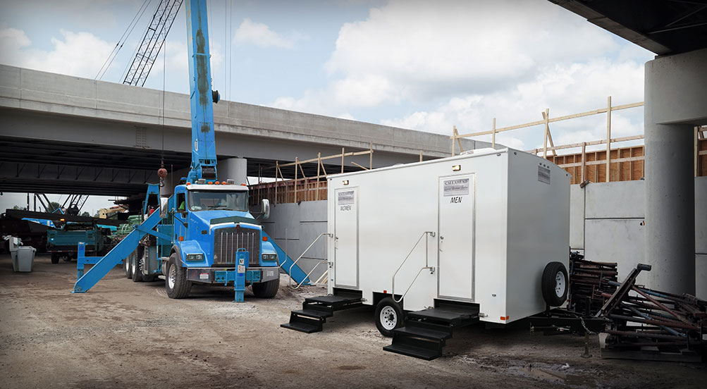 THE CREW RESTROOM TRAILER Near Jobsite