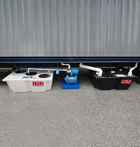 Porcelain Toilet System Under Trailer