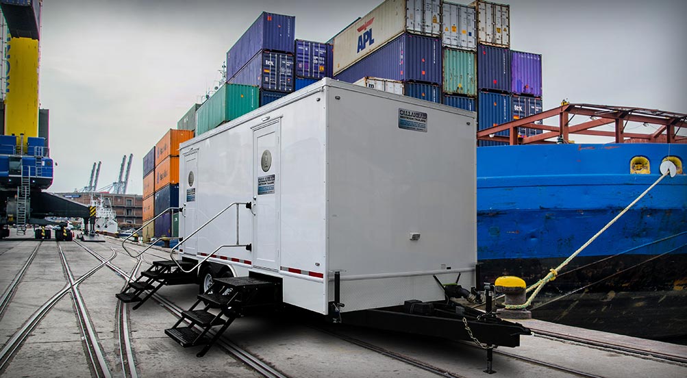 The Aqueduct Restroom Trailer Near Shipping Docks