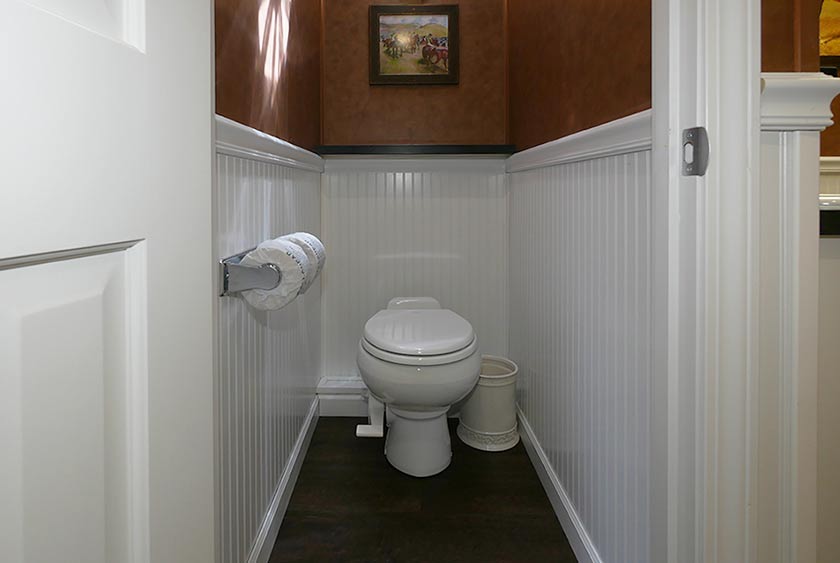 COMFORTABLE BATHROOM STALLS WITH FLOOR TO CEILING LOCKABLE DOORS