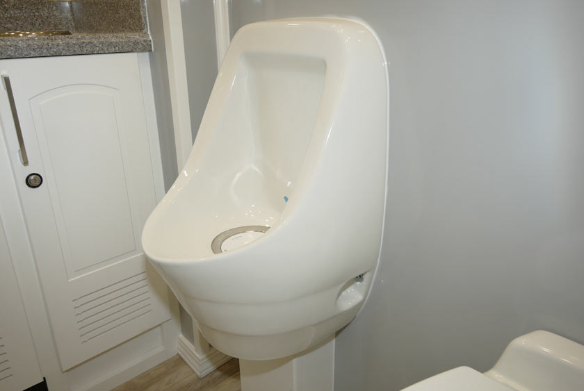 ODORLESS PORCELAIN URINAL IN MEN'S RESTROOM