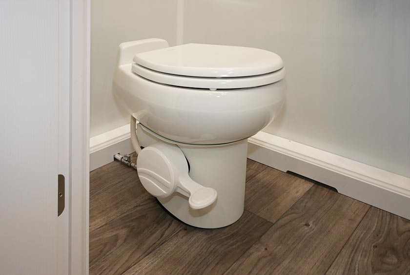 FULL SIZED PORCELAIN TOILETS WITH FOOT PEDAL FLUSH