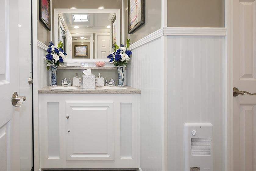 A CLEAN HOMELIKE DESIGN GREETS YOU INSIDE THE BRIGHTON BEACH RESTROOM TRAILER