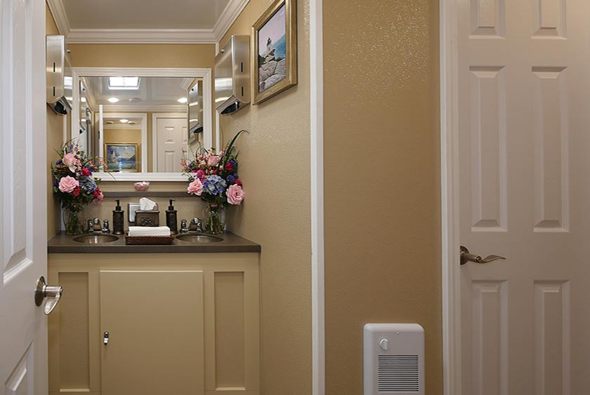 INSIDE THE CASTLE HILL LUXURY RESTROOM TRAILER