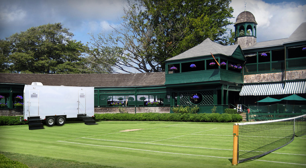 The Country Club Restroom Trailer Near A Sporting Event