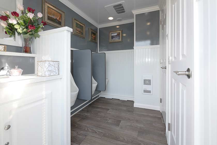 ENTRANCE TO THE MEN'S SIDE OF THE EAST END RESTROOM TRAILER