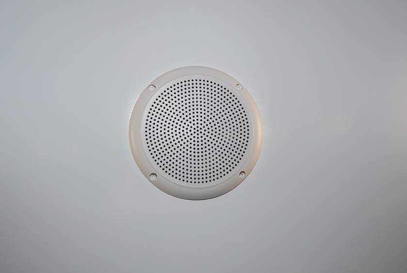 CENTRAL MUSIC SYSTEM WITH CEILING MOUNTED SPEAKERS