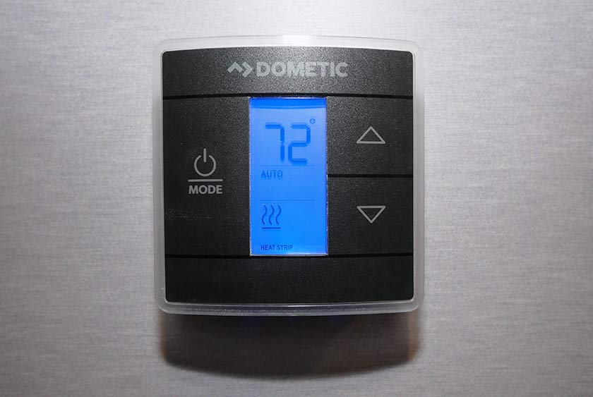 THERMOSTAT CONTROLLED AIR CONDITIONING FOR COMFORT