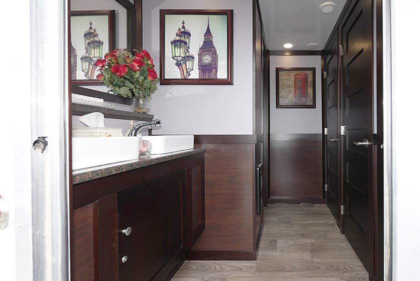 THE HYDE PARK RESTROOM TRAILER WOMEN'S ENTRANCE