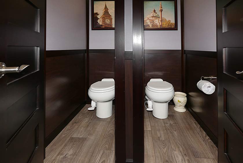 PRIVATE BATHROOM STALLS WITH FLOOR TO CEILING LOCKABLE DOORS