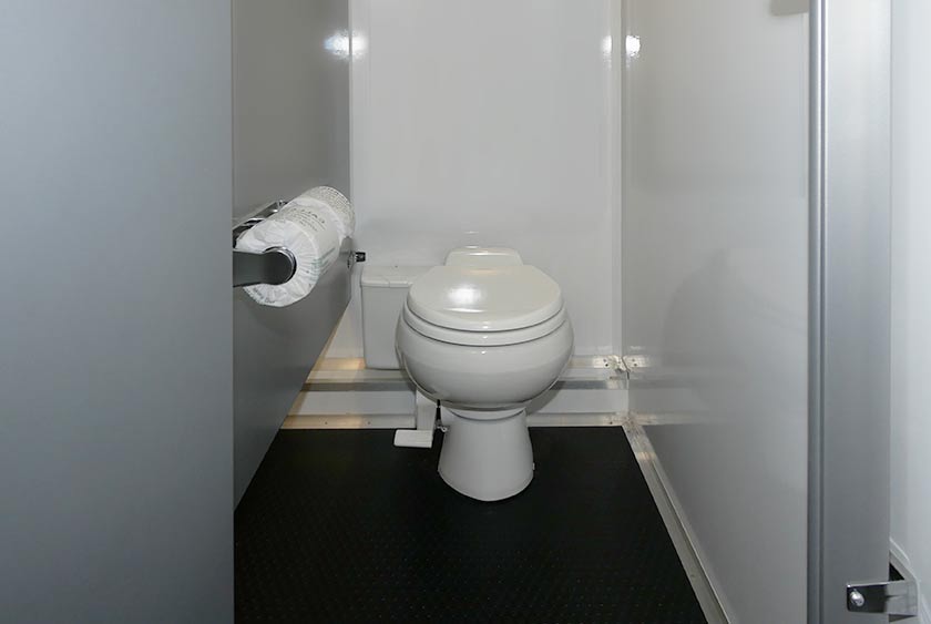 FULL SIZED PORCELAIN TOILETS, WITH A PEDAL FLUSHING MECHANISM 