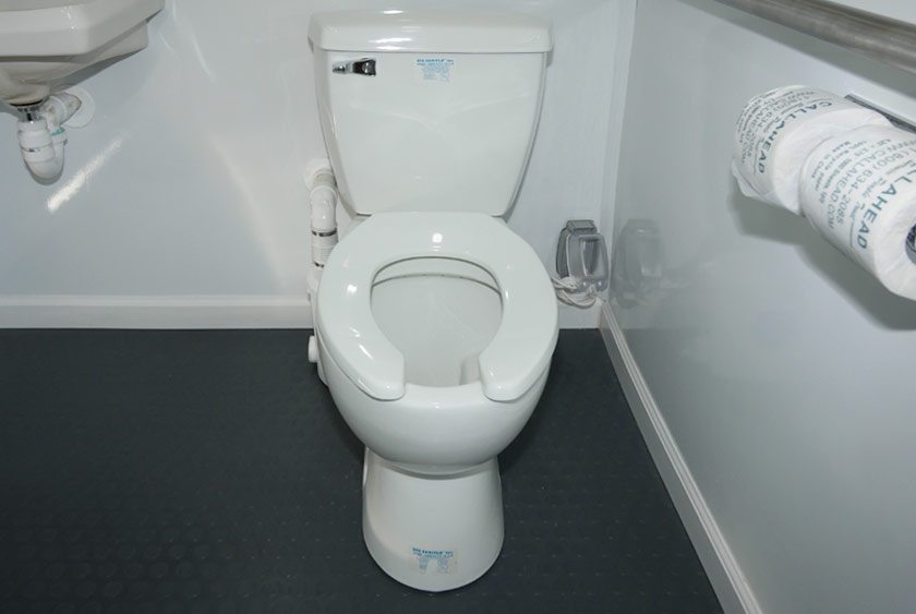 FULL SIZED PORCELAIN TOILET