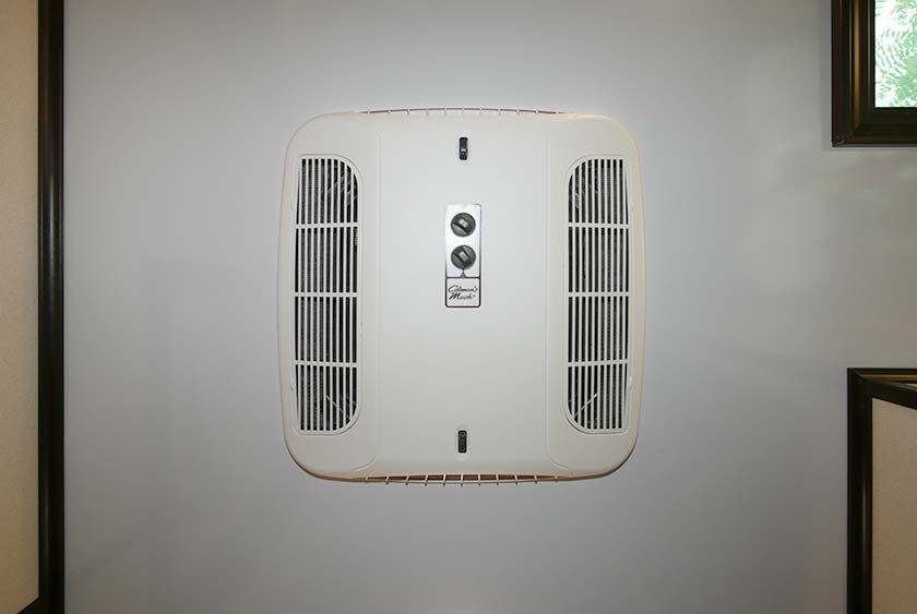 CENTRAL AIR CONDITIONING CONTROLLED BY THERMOSTAT