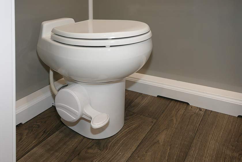 FULL SIZED PORCELAIN TOILETS WITH FOOT PEDAL FOR HANDS FREE FLUSHING