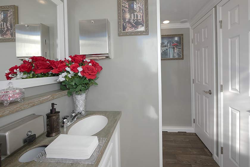 THE COBBLE HILL RESTROOM TRAILER LADIES' SIDE