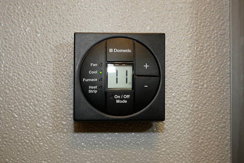 THERMOSTAT CONTROLLED CENTRAL AIR CONDITIONING 