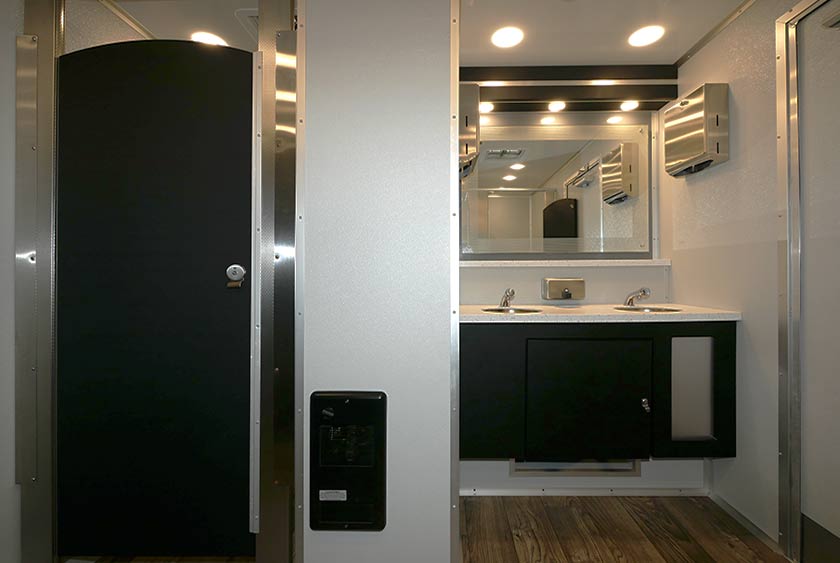 WOMEN'S ENTRANCE TO THE CREW RESTROOM TRAILER