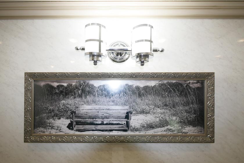 ART DECO STYLE SCONCES ADD STYLE TO THE INTERIOR OF THE RESTROOMS