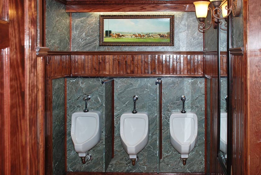 THREE PORCELAIN URINALS FOR MEN
