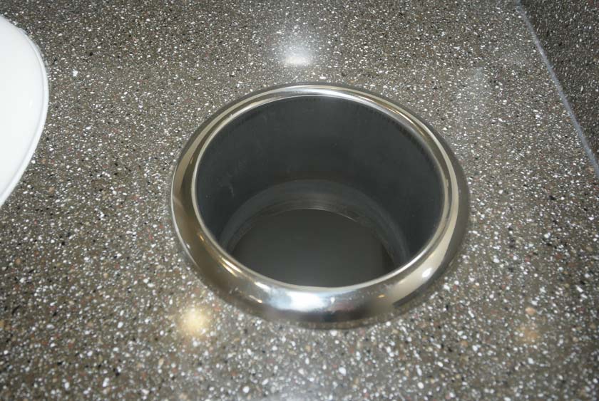 TRASH RECEPTACLES IN VANITY