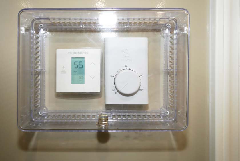 THERMOSTAT CONTROLLED HEAT AND AIR CONDITIONING