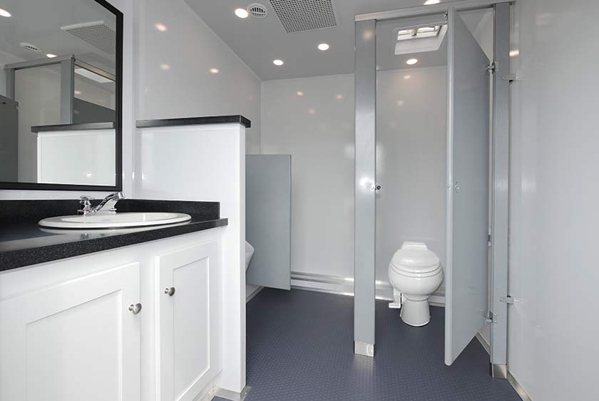 MEN'S SIDE ENTRANCE - THE GRANITE RESTROOM TRAILER