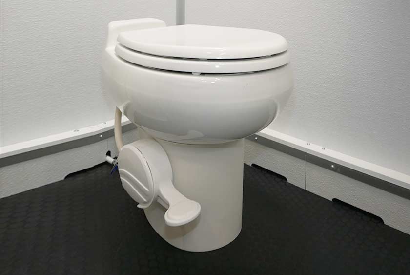 FULL SIZED PORCELAIN TOILET WITH FOOT PEDAL FLUSHING