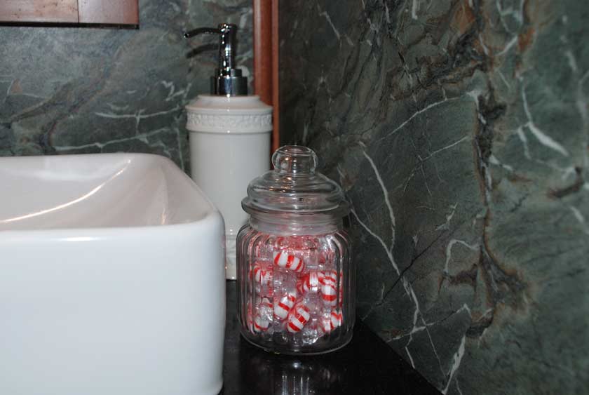 ADDITIONAL AMENITIES INCLUDE FILLED CANDY DISHES