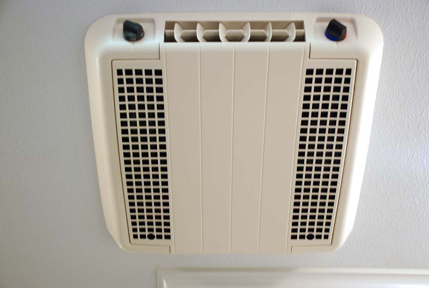 THERMOSTAT CONTROLLED AIR CONDITIONER AND HEAT