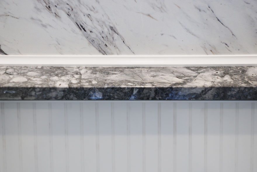 WOOD TRIM AND MARBLE SHELVES