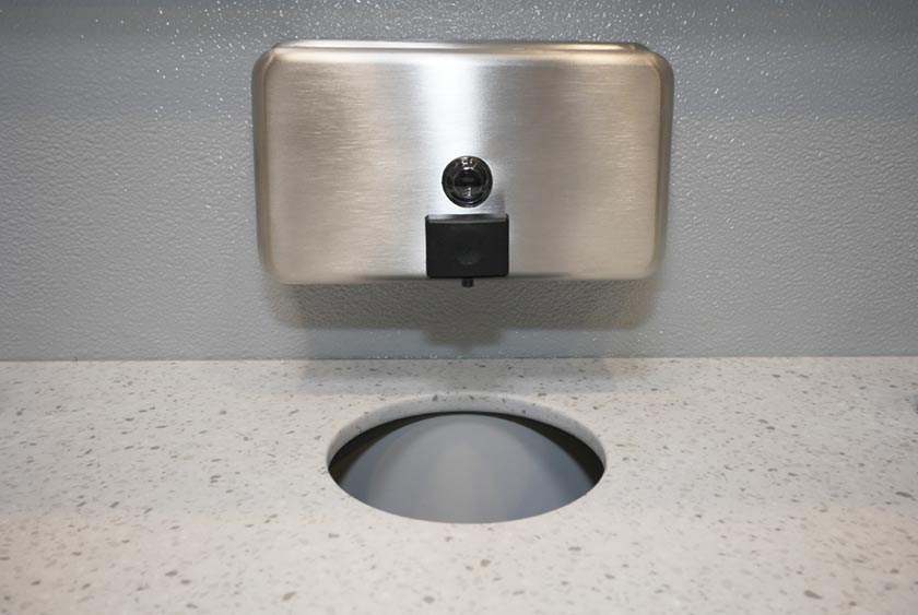 SOAP DISPENSER WITH TRASH RECEPTACLE