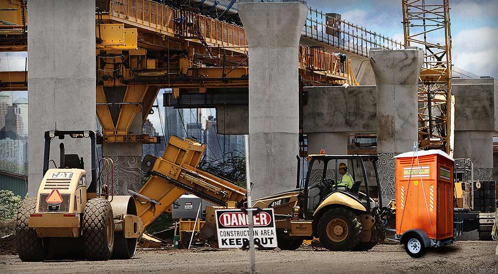 The Safety Head Portable Restroom Trailer Near Highway Construction