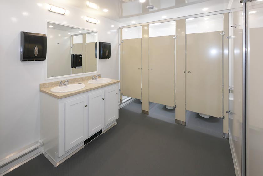 BRIGHT AND CLEAN INTERIOR OF RESTROOM TRAILER