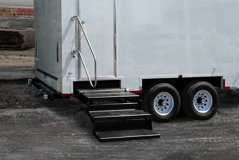 NON-SKID STAIRWAYS WITH STAINLESS STEEL RAILINGS PROVIDE SECURE ENTRY / EXIT