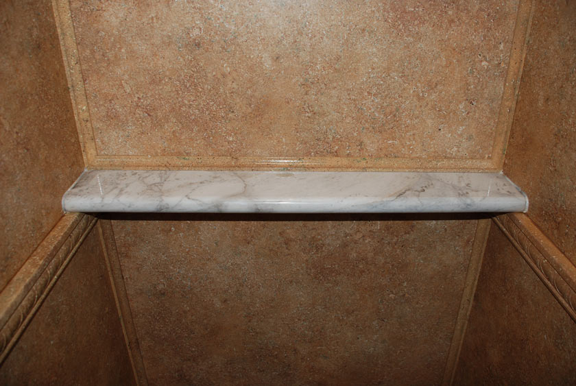 MARBLE SHELVES IN EACH STALL