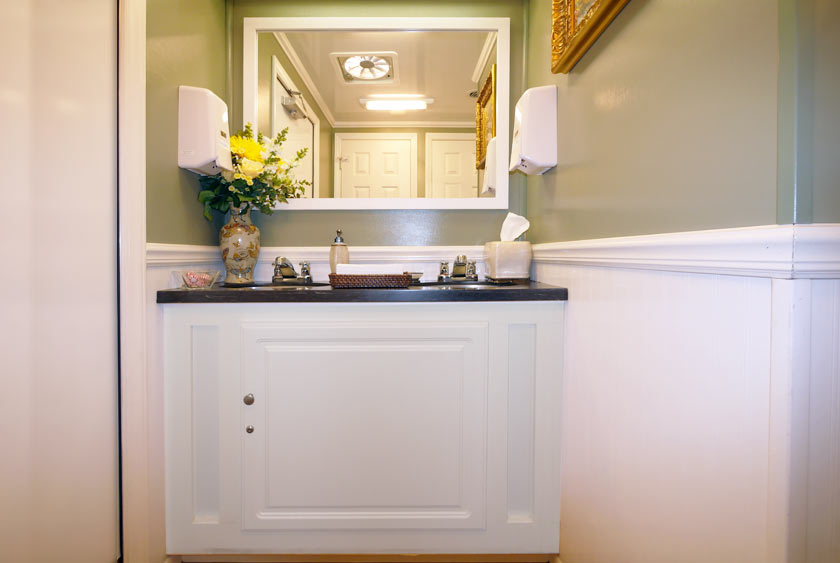 MODERN VANITY WITH CORIAN COUNTERTOPS AND STAINLESS SINK BASINS