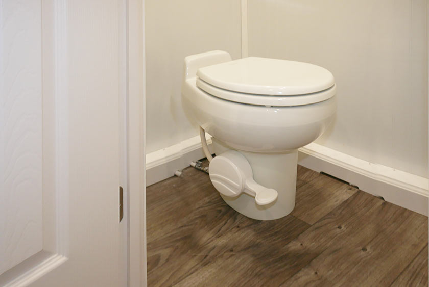 TOILETS HAVE A FOOT PEDAL FLUSH SYSTEM FOR CONVENIENCE