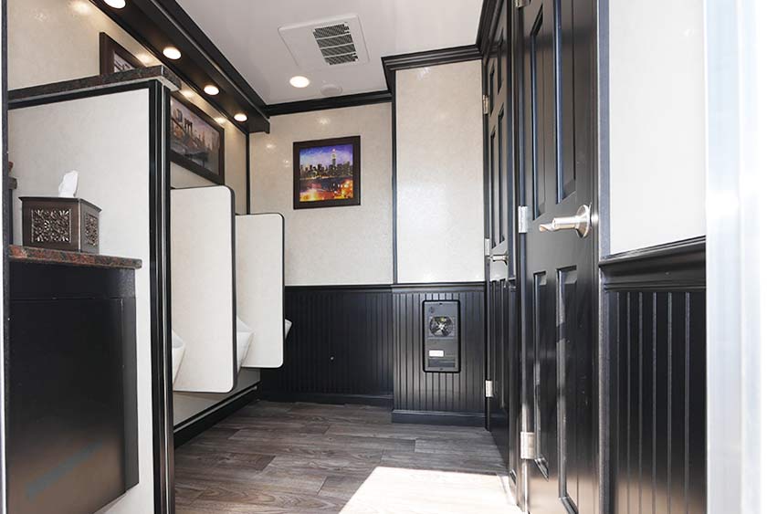 THE WILLIAMSBURG LUXURY RESTROOM TRAILER MEN'S ENTRANCE