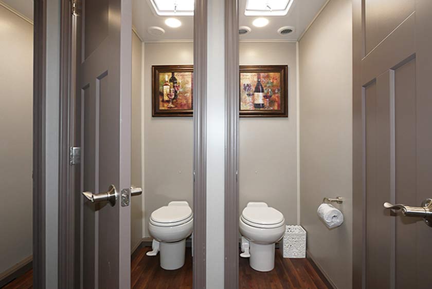 FOUR PRIVATE BATHROOM STALLS ON THE WOMEN'S SIDE