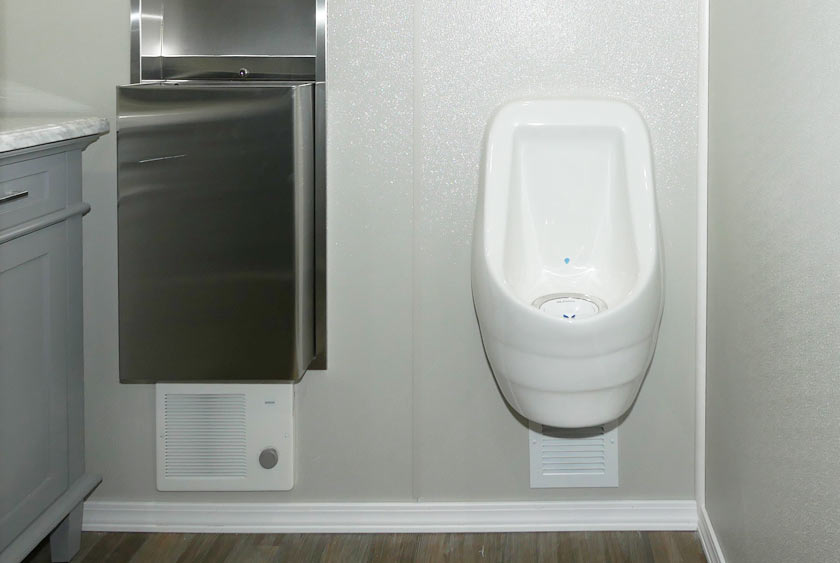 COMFORTABLE SPACE WITH FLOOR TO CEILING LOCKING TOILET STALLS