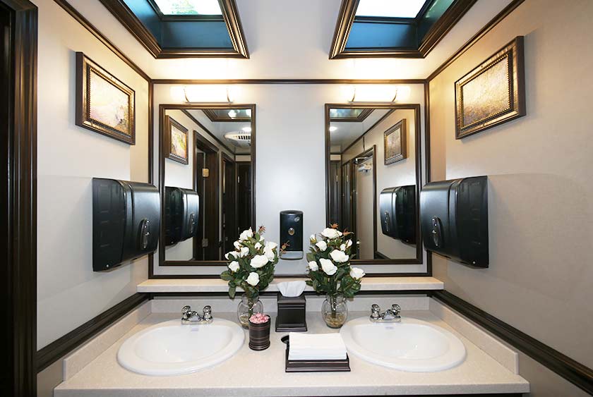 DUAL PORCELAIN SINKS, DUAL MIRRORS AND PAPER TOWEL DISPENSERS